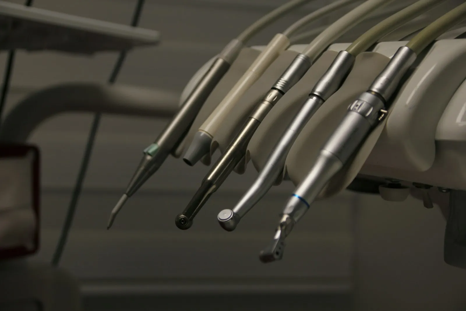 Wall-mounted dental instrument cabinet in a clinical room