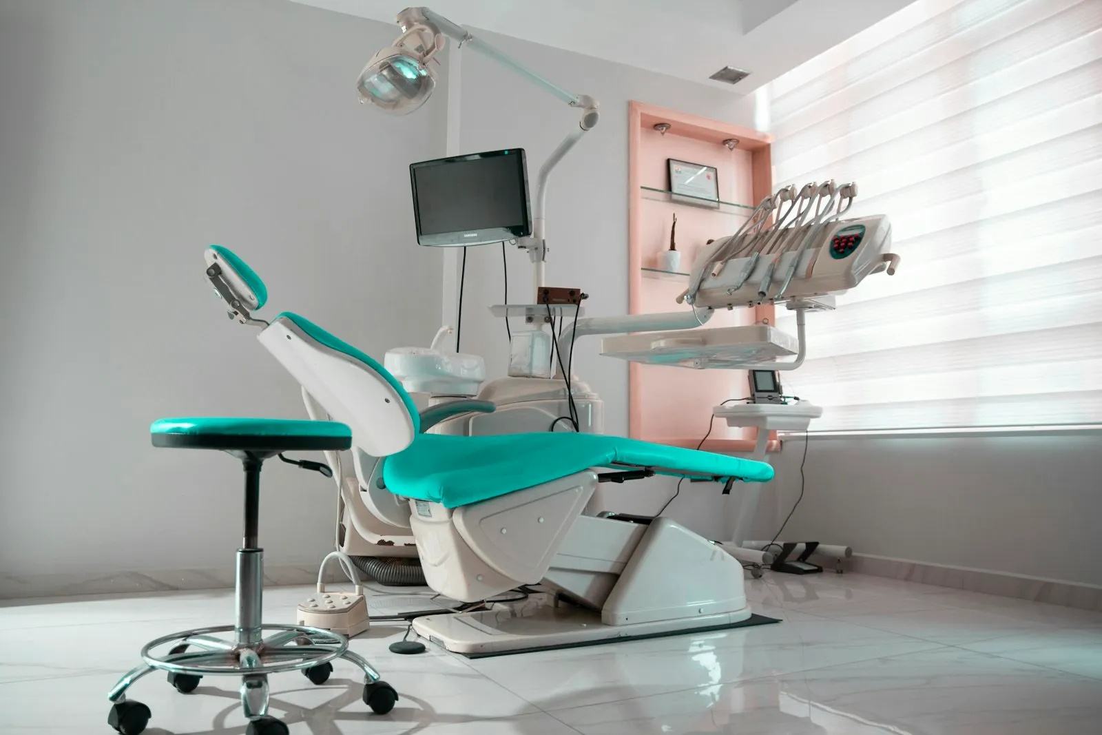 Screen in a dental treatment room displaying imaging
